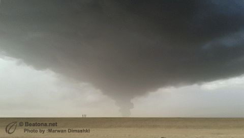 Huge black smoke plume over the city of Jahra